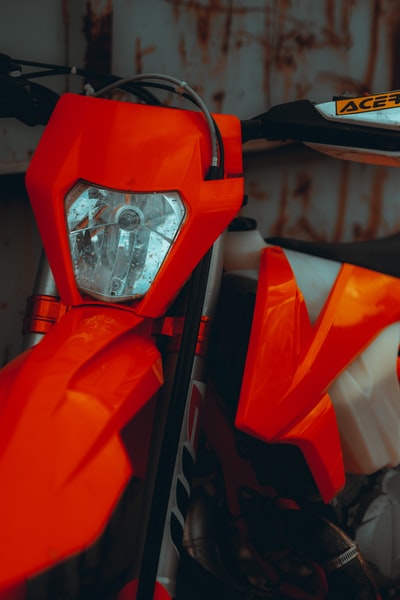 Orange and yellow red motorcycle shell
